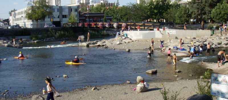Wingfield Park on the Truckee River in downtown Reno, Nevada.  Formerly a derelict site, this reach of river was transformed into a popular recreational area, serving a wide demographic.  (photo by Matt Kondolf)